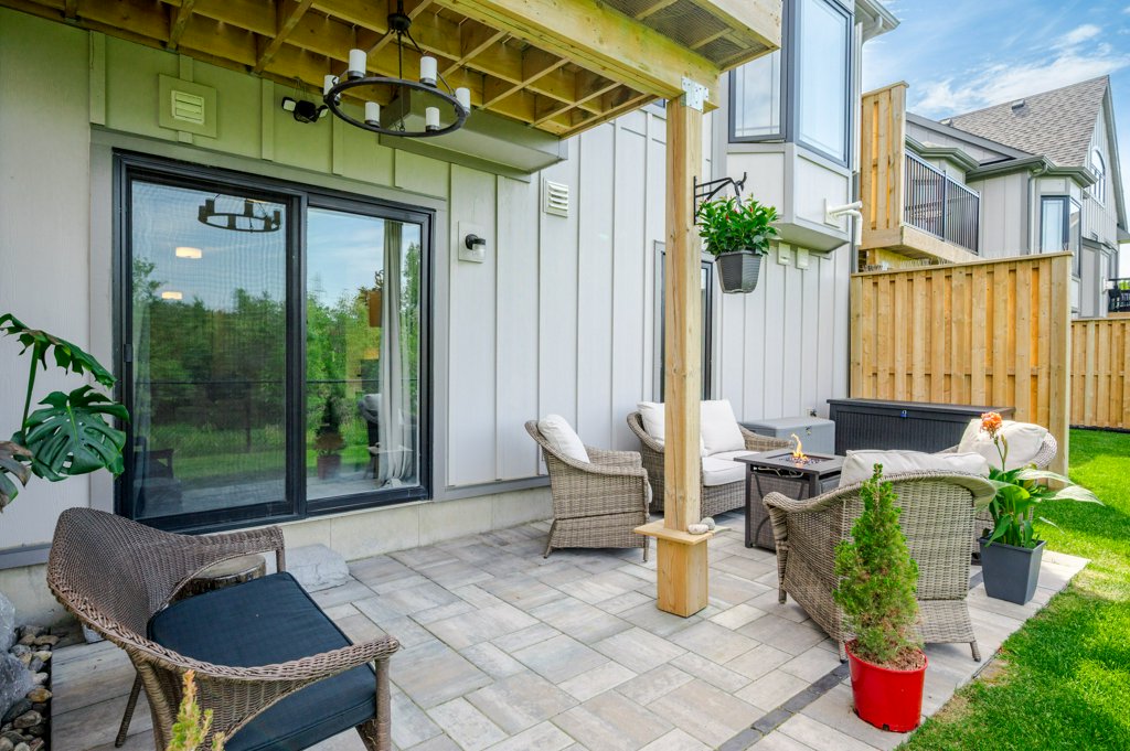 80 Marsh Avenue, Unit 78 - Patio with pergola overlooking the yard