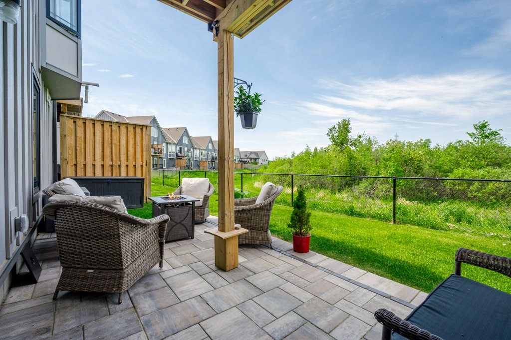 80 Marsh Avenue, Unit 78 - Patio with pergola and wicker seating