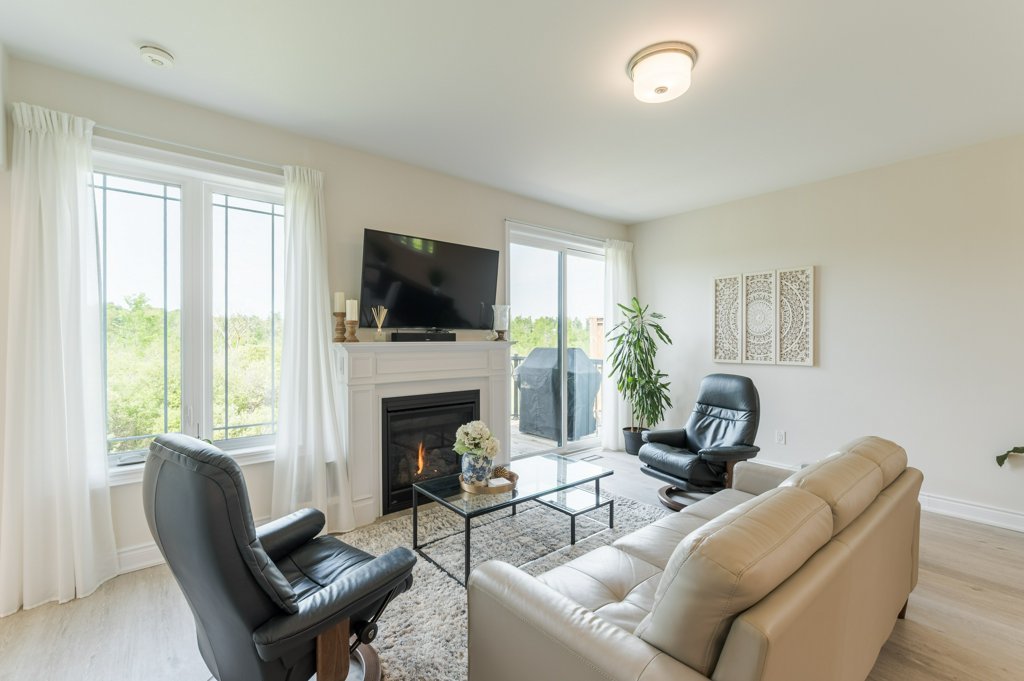 80 Marsh Avenue, Unit 78 - Living room with fireplace
