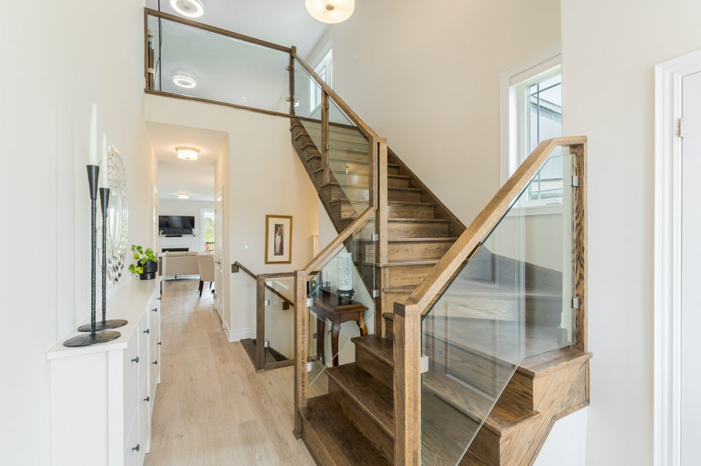 80 Marsh Avenue, Unit 78 - Foyer with staircase and console table