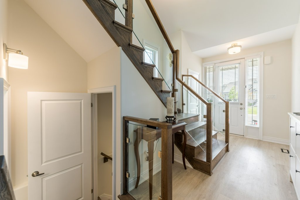 80 Marsh Avenue, Unit 78 - Entryway staircase with glass railing