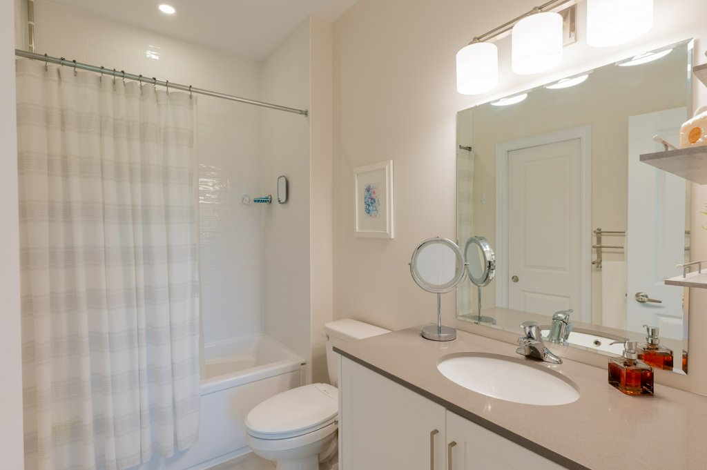 80 Marsh Avenue, Unit 78 - Bathroom with tub and vanity