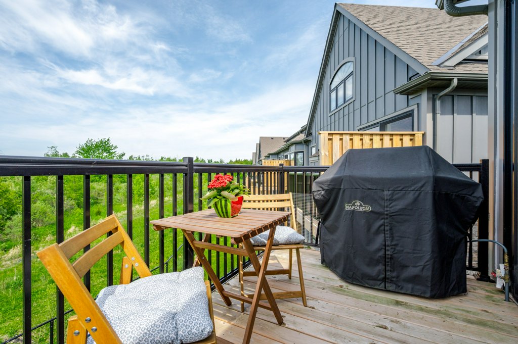 80 Marsh Avenue, Unit 78 - Deck with seating and BBQ overlooking greenspace